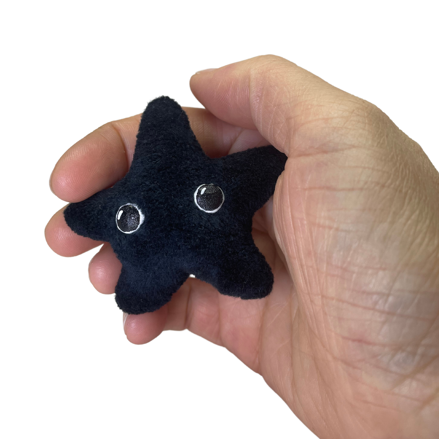 luminescent little black star plushie