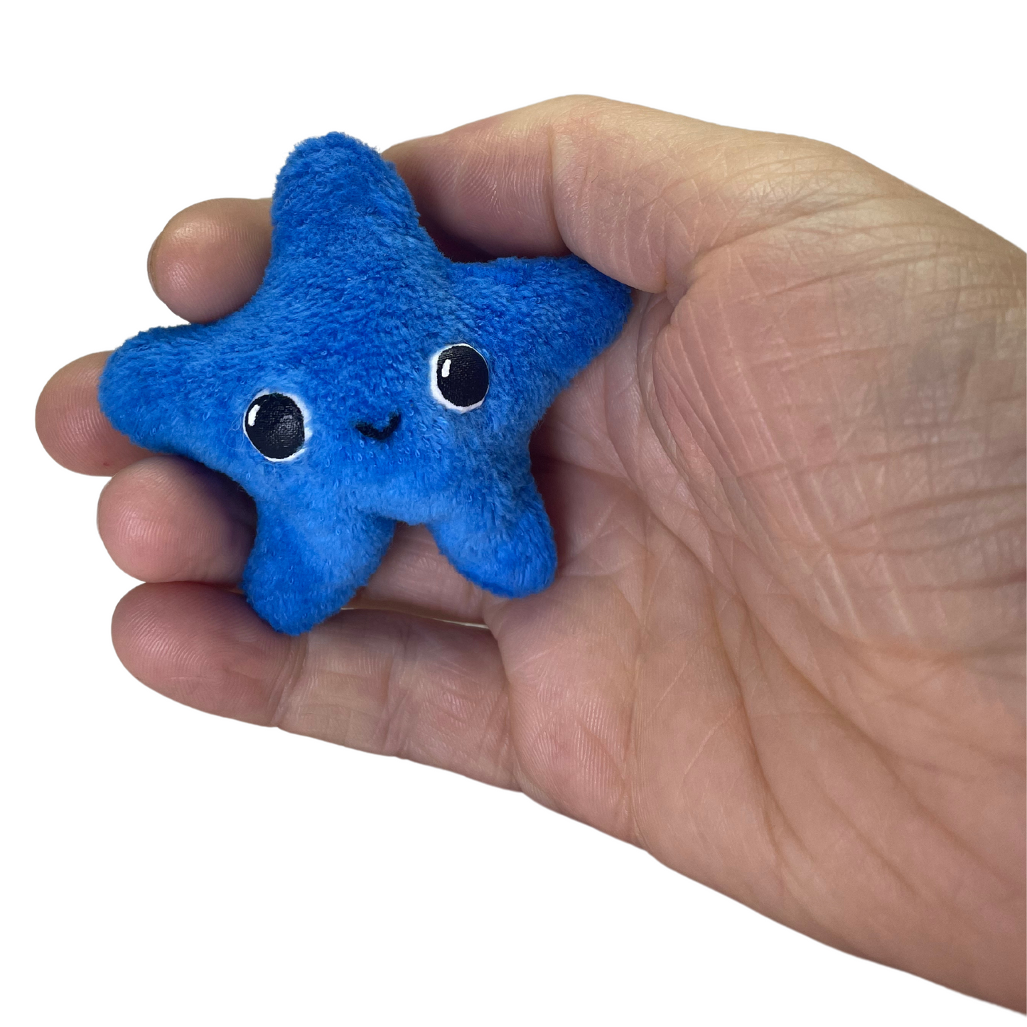 luminescent little bright blue star plushie